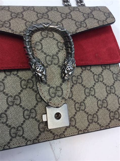 gucci snake carry on bags|Gucci bag with snake buckle.